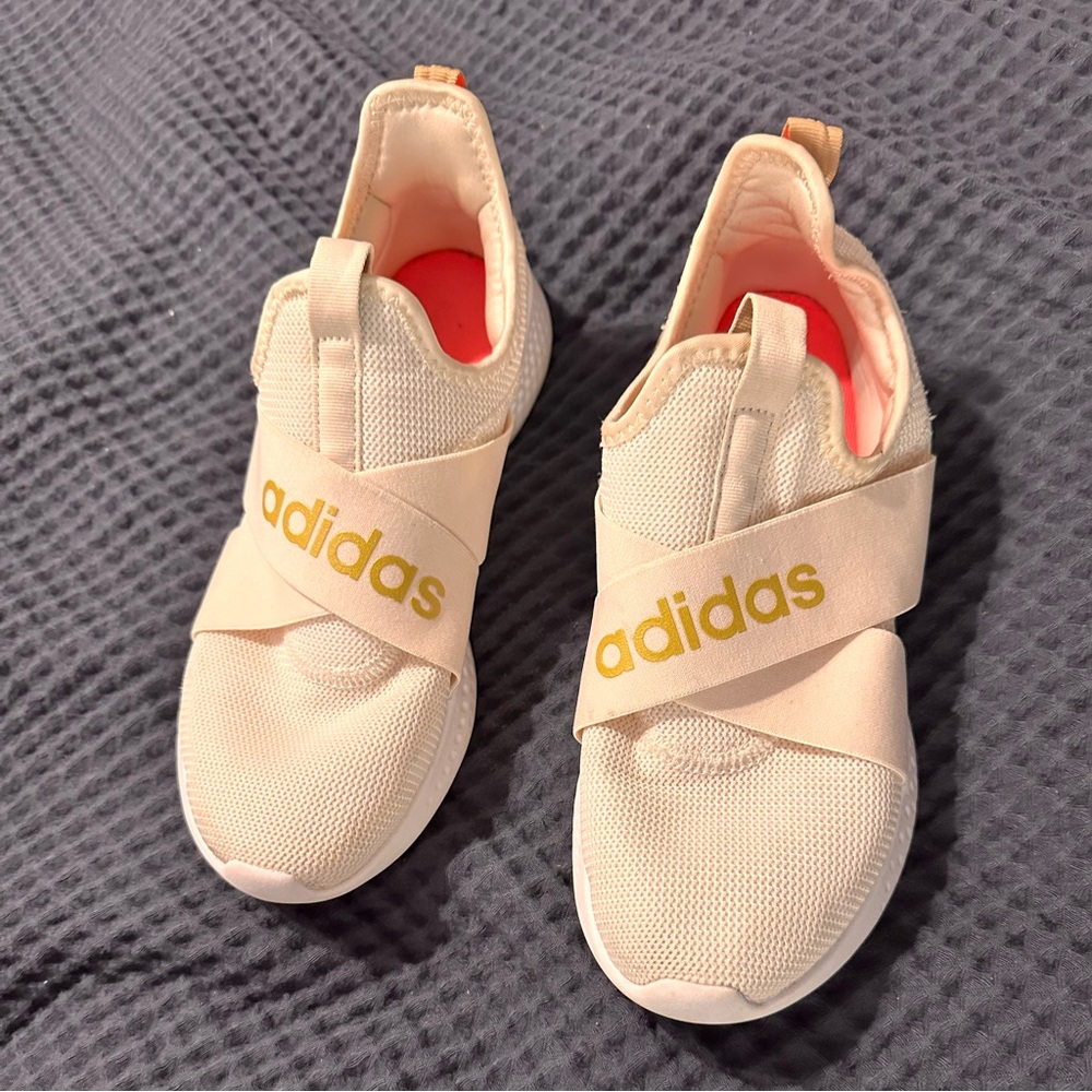 Women’s cream adidas tennis shoes